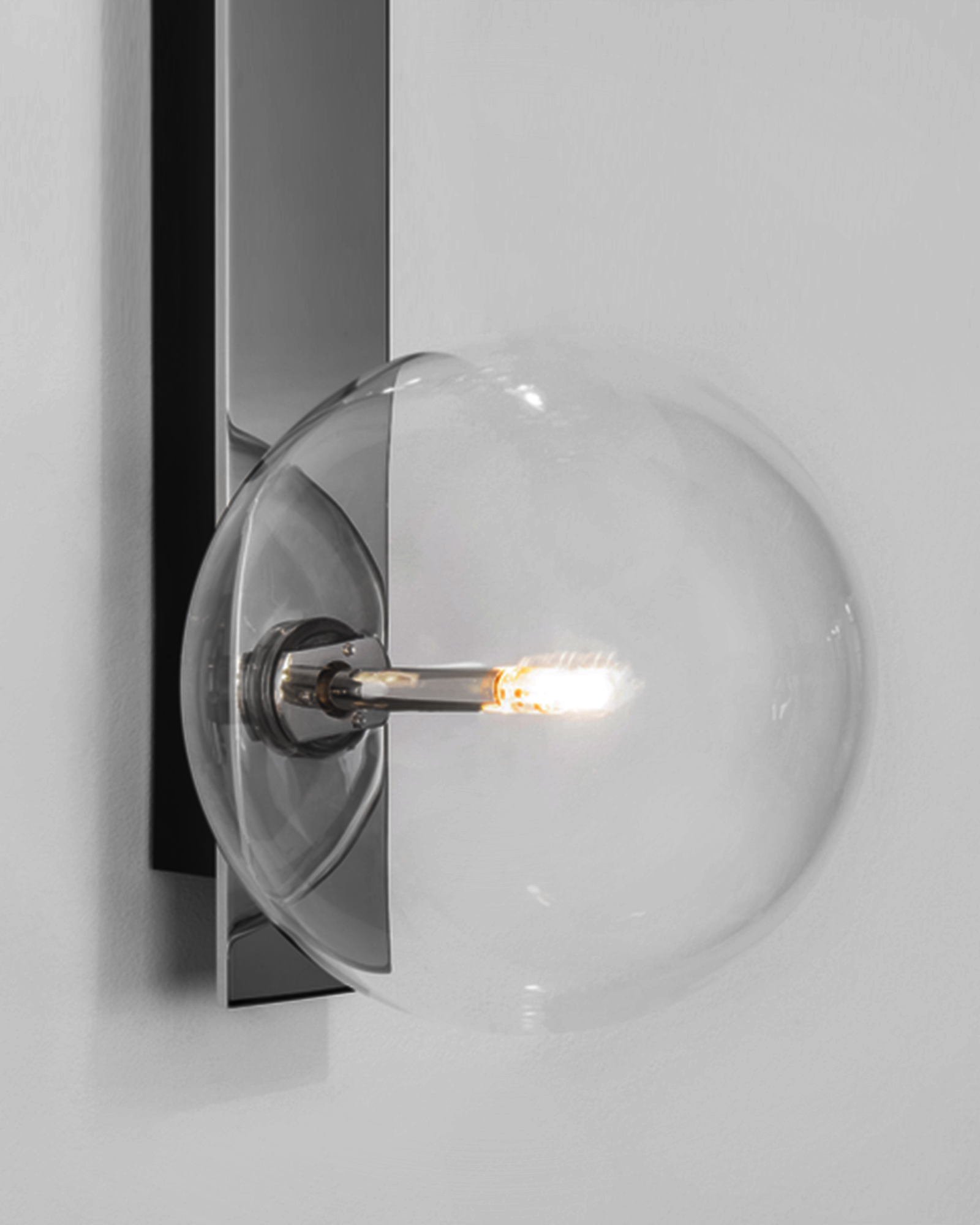 Schwung Oslo Dual Polished Nickel Transparent Globe Wall Light
